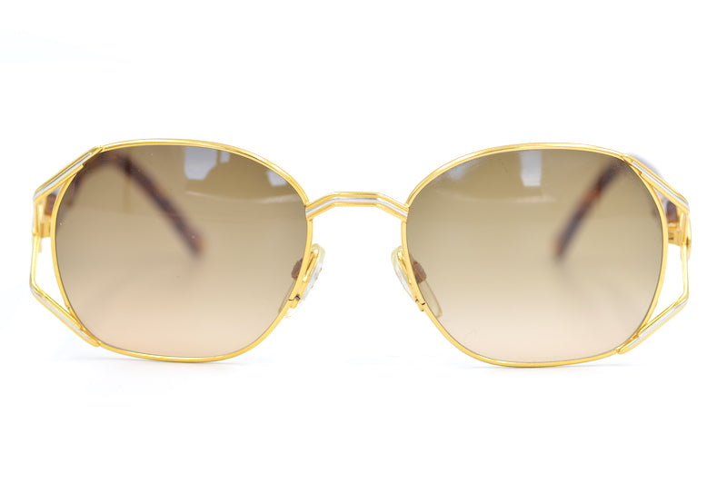 Enrique Loewe Knappe Gaia Sunglasses. Loewe Sunglasses. Women's Designer sunglasses. Luxury sunglasses. Gold platinum plated sunglasses.