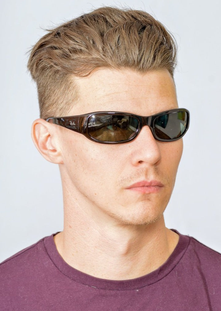 RayBan 4137 up-cycled sunglasses. Wrap around sunglasses. Sporty sunglasses. Cheap RayBan sunglasses.